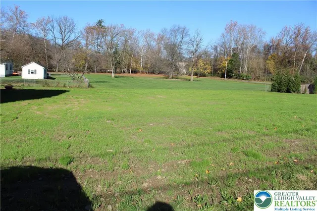 a view of a golf course with a garden