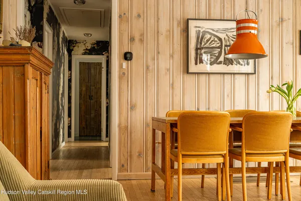 a bedroom with a bed and a table