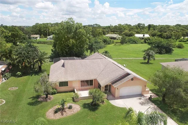 an aerial view of a house with garden