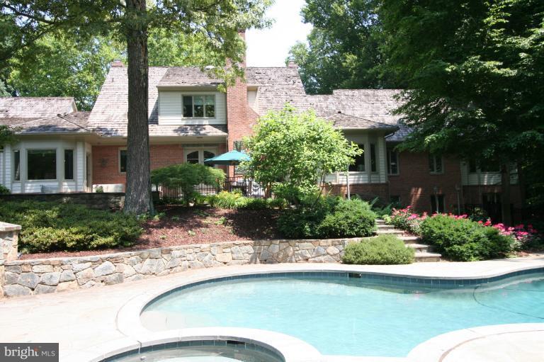 11114 Cripplegate Road Potomac, MD 20854 - Photo 14 of 30 a view of a house with a yard