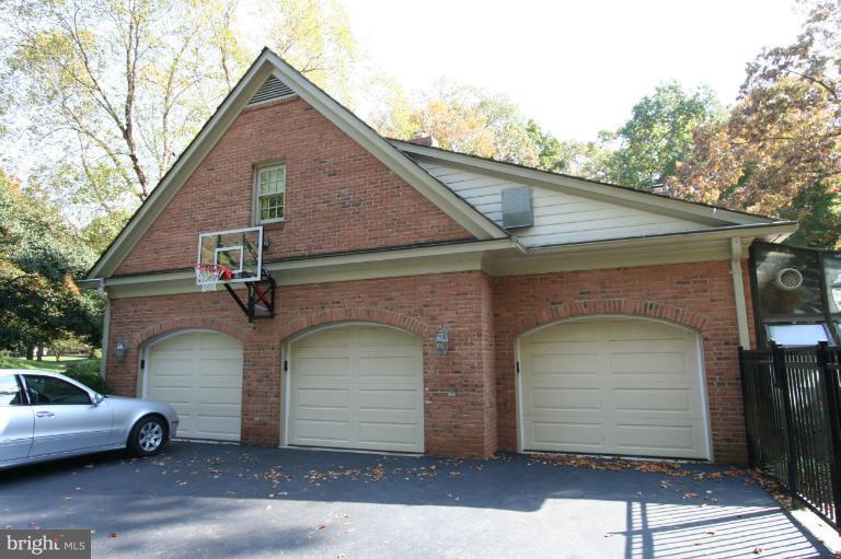 11114 Cripplegate Road Potomac, MD 20854 - Photo 30 of 30 a view of front of a house with garage