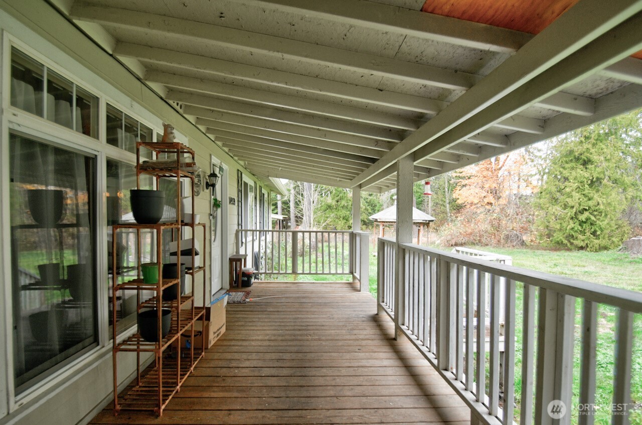 14939 Turner Road Southeast Rainier, WA 98576 - Photo 2 of 24 a view of a porch with wooden floor