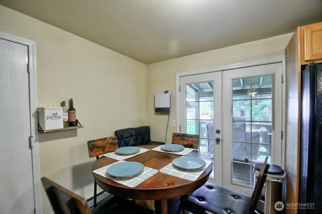 a view of a dining room with furniture