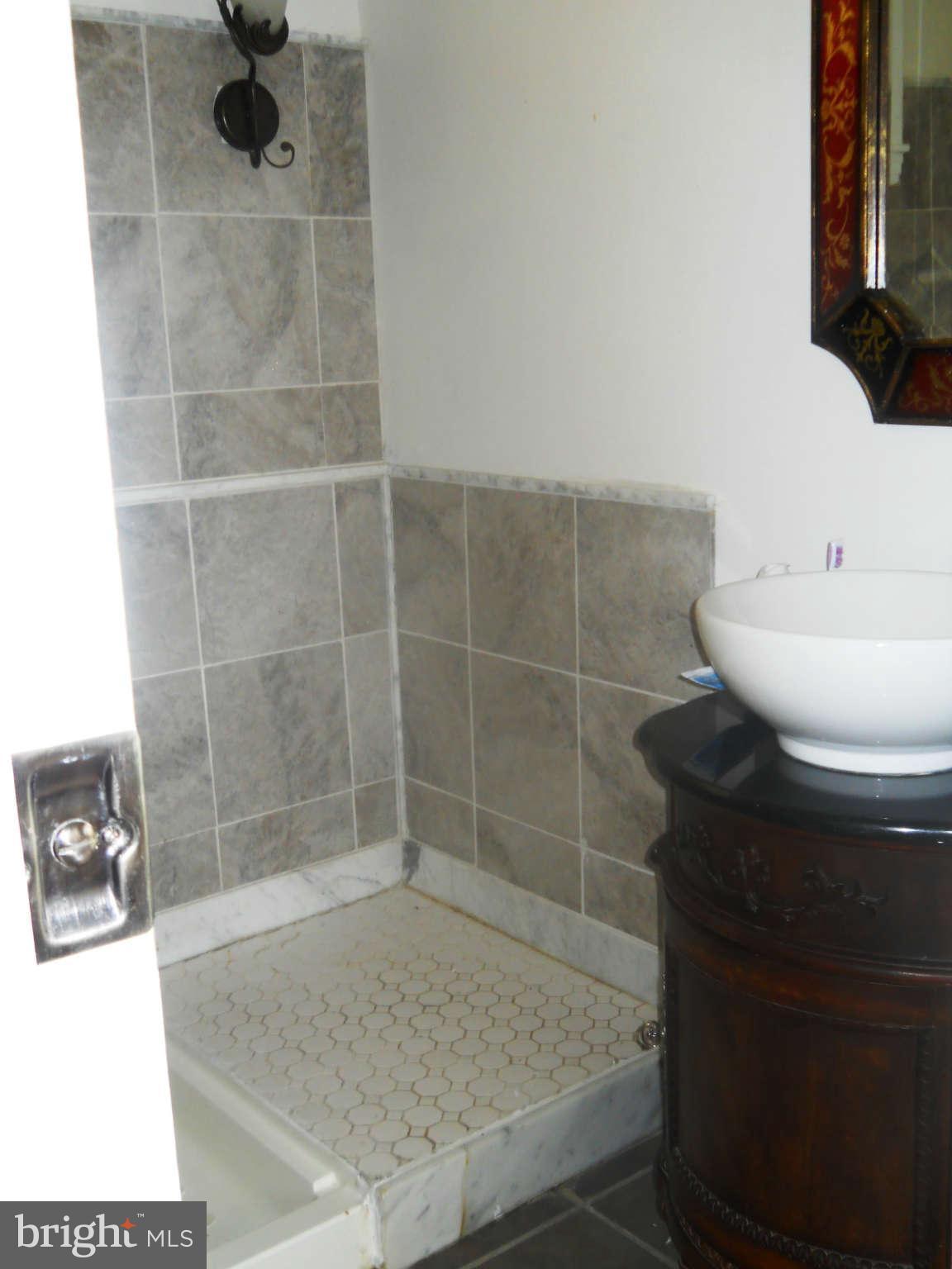 236 Mallow Hill Road Baltimore, MD 21229 - Photo 10 of 25 Bath 1st floor full bath w/ shower