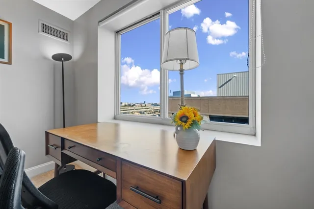 a room with furniture and a window