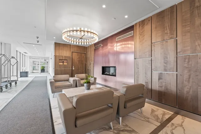 a view of a hallway with a potted plant