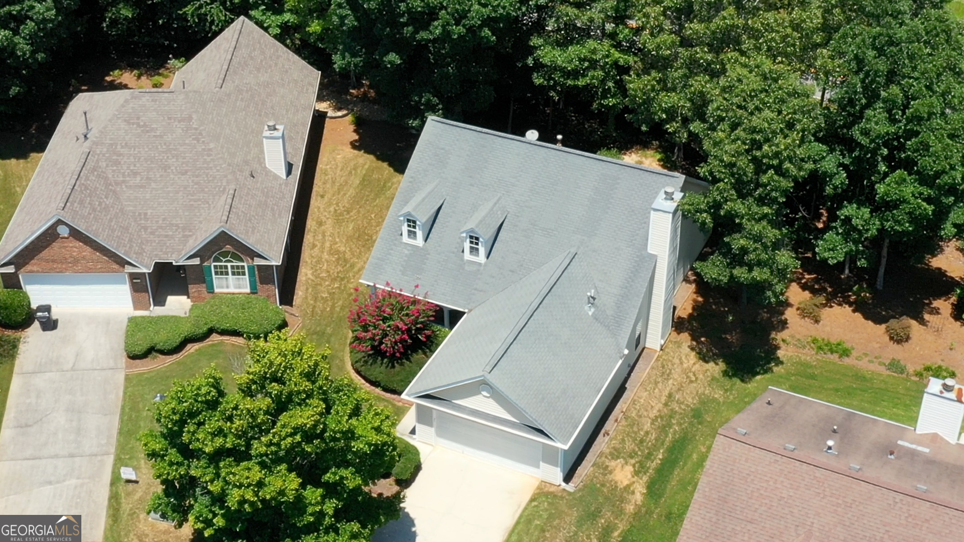 1150 Strath Clyde Way McDonough, GA 30253 - Photo 6 of 28 an aerial view of a house with a yard and potted plants