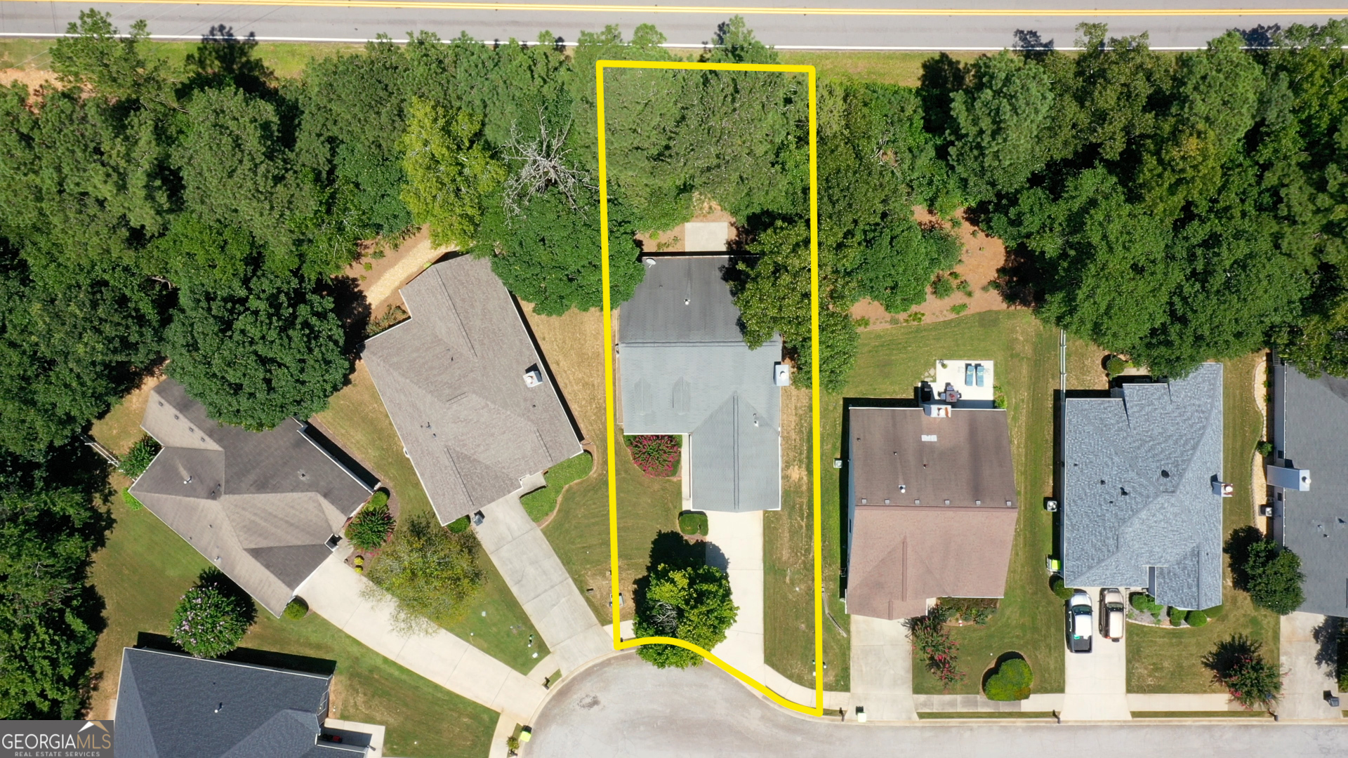 1150 Strath Clyde Way McDonough, GA 30253 - Photo 7 of 28 an aerial view of a house with a yard basket ball court and outdoor seating