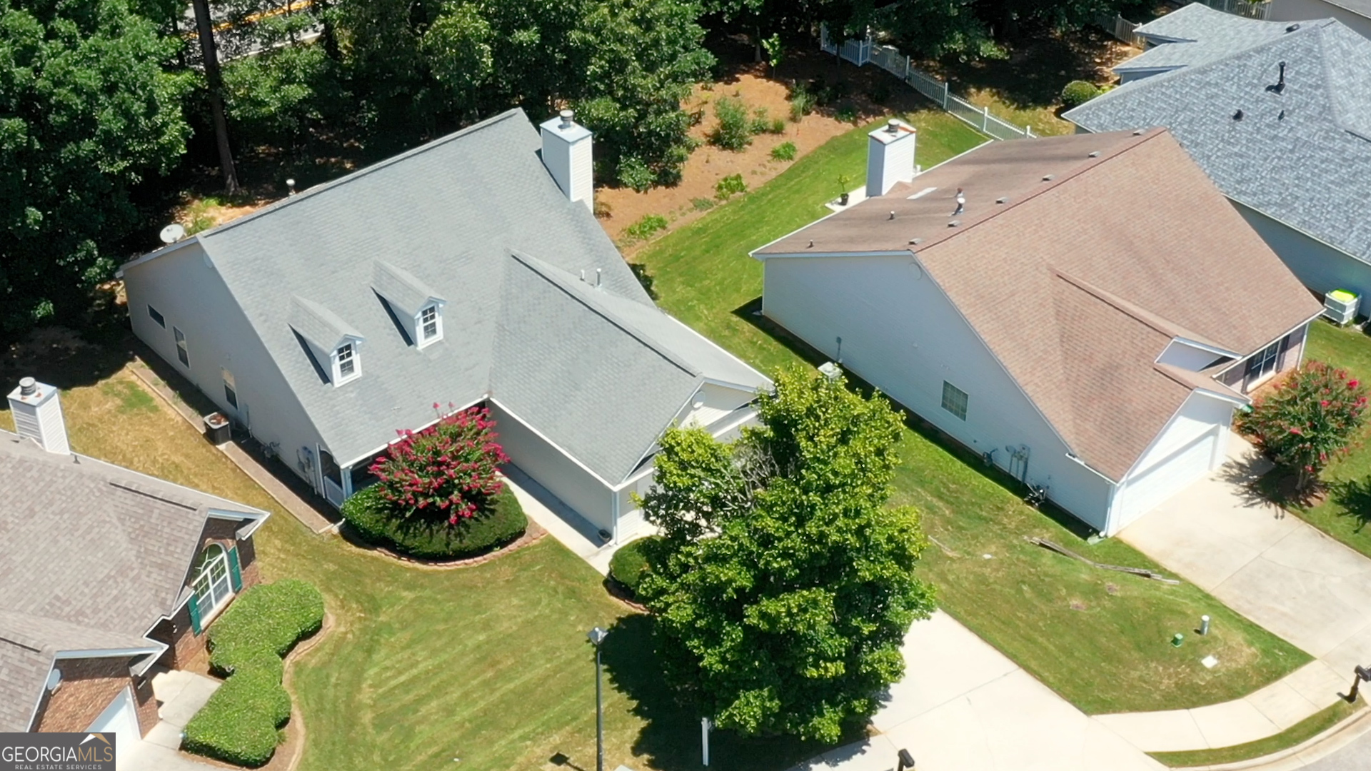 1150 Strath Clyde Way McDonough, GA 30253 - Photo 8 of 28 an aerial view of a house with a yard and potted plants