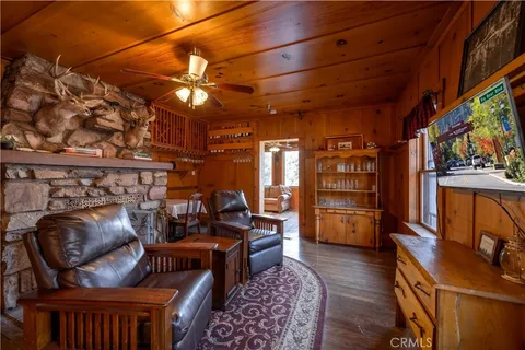 a view of an chairs and a table in a room