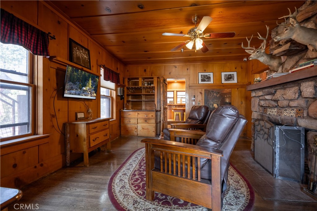 869 Knickerbocker Road Big Bear Lake, CA 92315 - Photo 13 of 50 a view of an chairs and a table in a room
