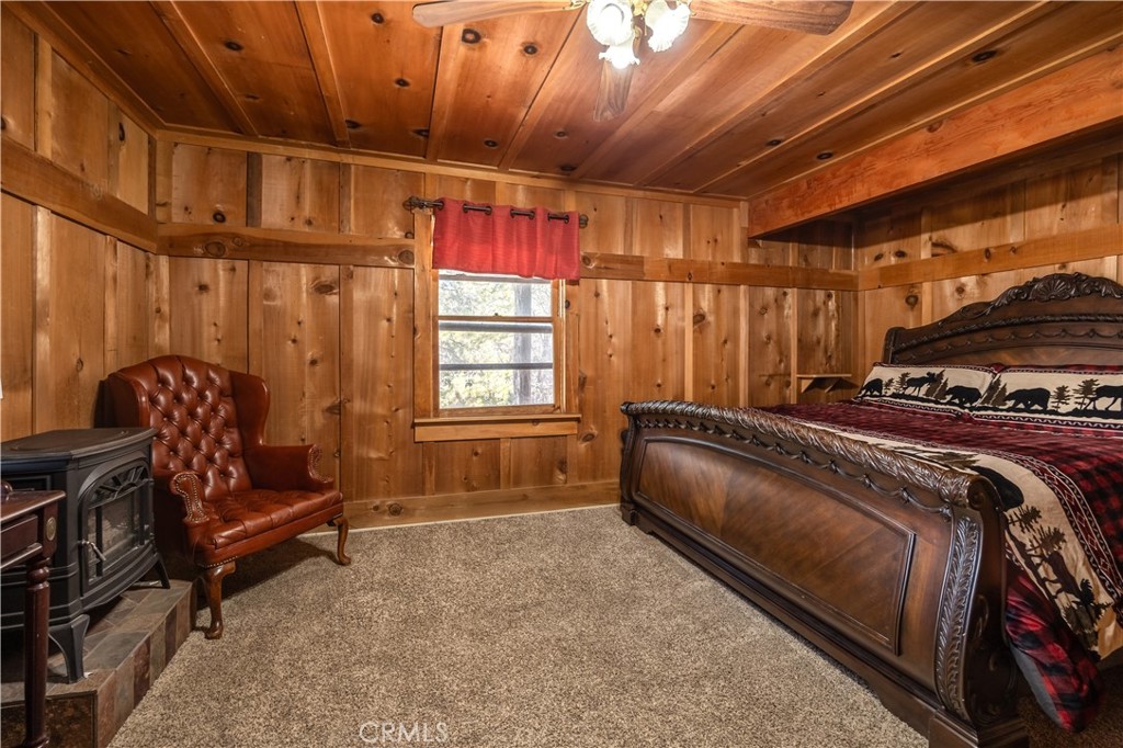 869 Knickerbocker Road Big Bear Lake, CA 92315 - Photo 25 of 50 a bed room with a bed and a window