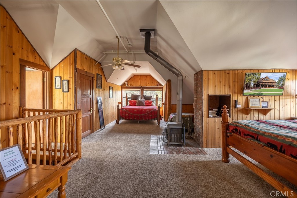 869 Knickerbocker Road Big Bear Lake, CA 92315 - Photo 31 of 50 a view of living room with furniture and a flat screen tv