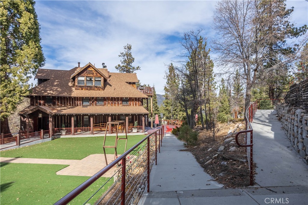 869 Knickerbocker Road Big Bear Lake, CA 92315 - Photo 36 of 50 a view of a house with a yard