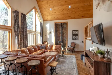 a spacious bedroom with a bed and a walk in closet