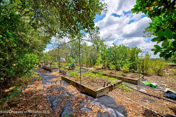 $585,000 | 11422 Warm Wind Way, Weeki Wachee, FL 34613