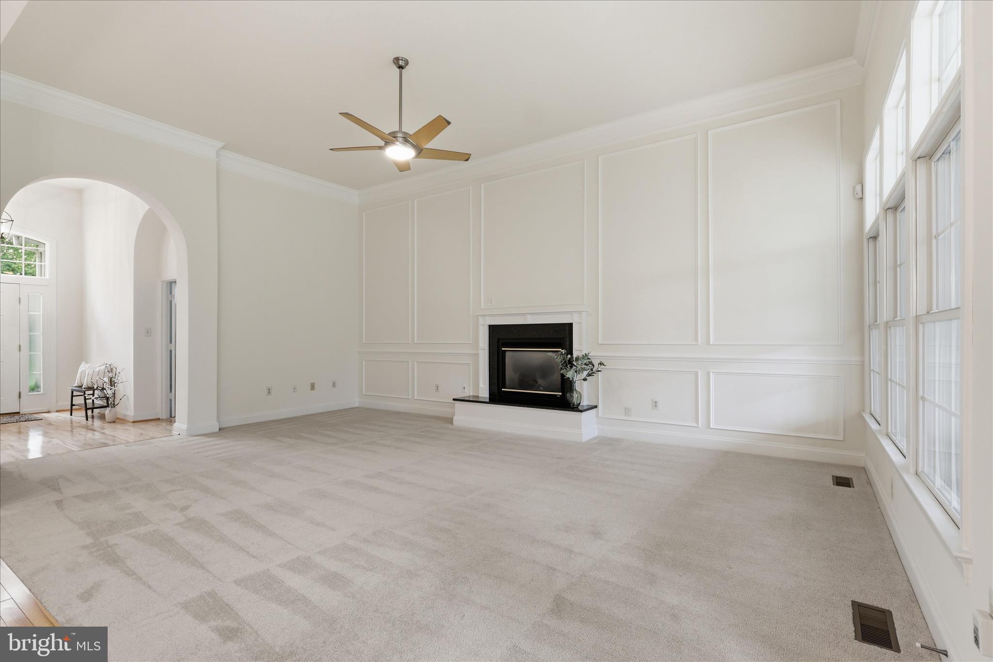 8277 Roxborough Loop Gainesville, VA 20155 - Photo 18 of 84 Family Room with Custom Molding