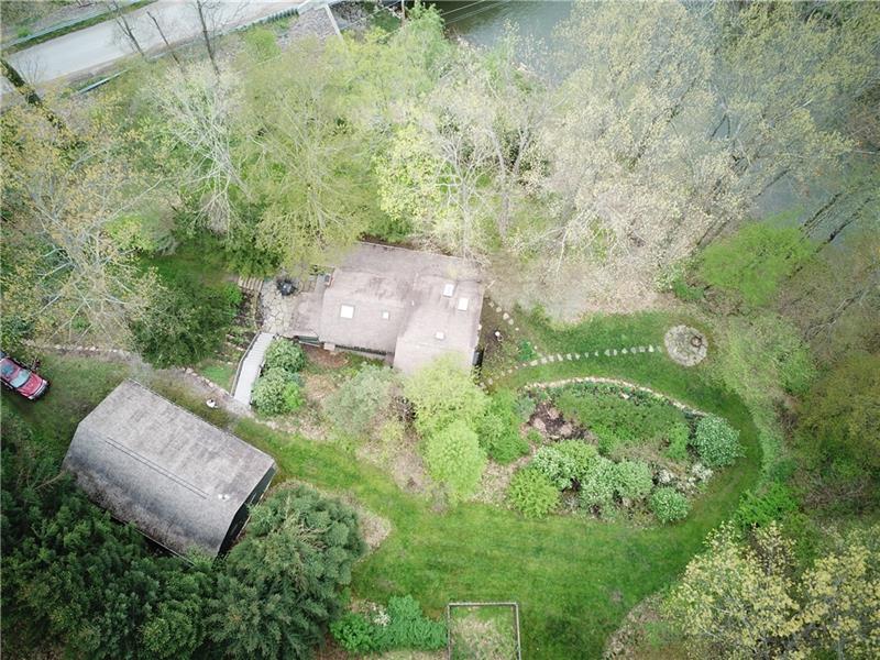 1956 Stoughton Road Slippery Rock, PA 16057 - Photo 3 of 25 Ariel View of the Property located at 1956 Stoughton Road - Landscaped Grounds and Fire Pit Area