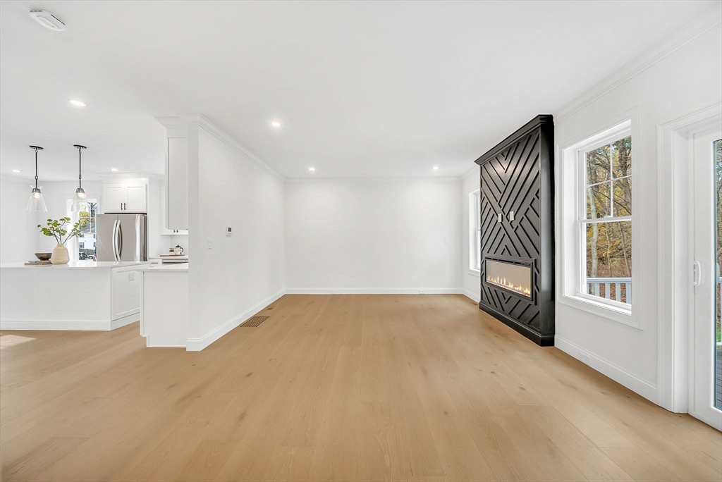 57 Raymond Street, Unit 2 Franklin, MA 02038 - Photo 11 of 41 a view of an empty room with a window
