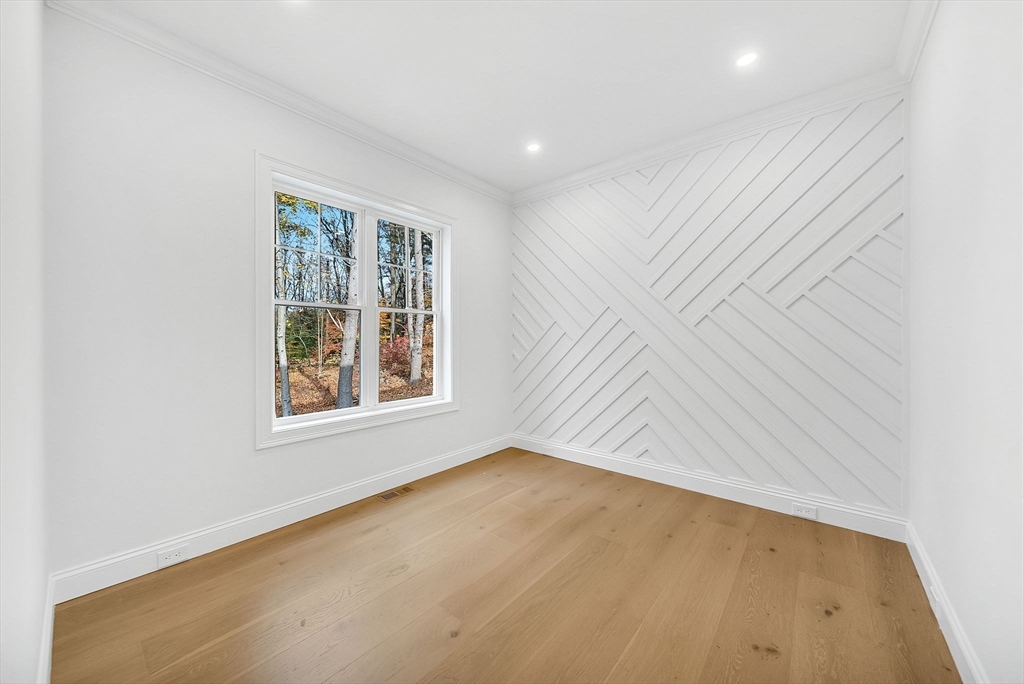 57 Raymond Street, Unit 2 Franklin, MA 02038 - Photo 15 of 41 an empty room with windows