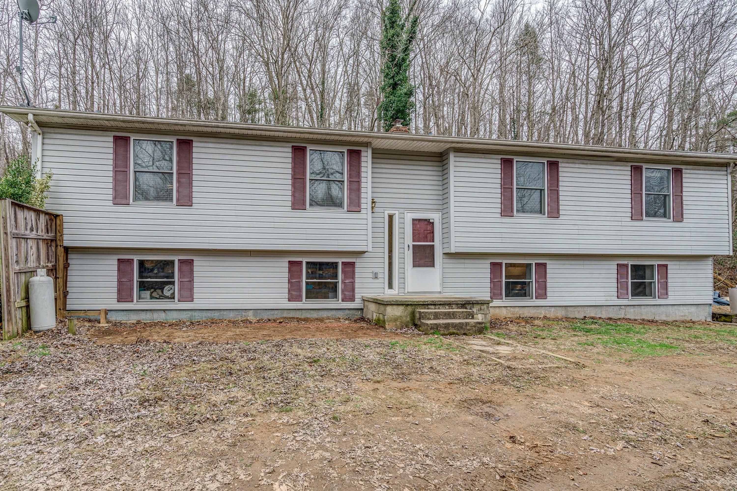 6071 Goodview Road Goodview, VA 24095 - Photo 2 of 44 a backyard of a house