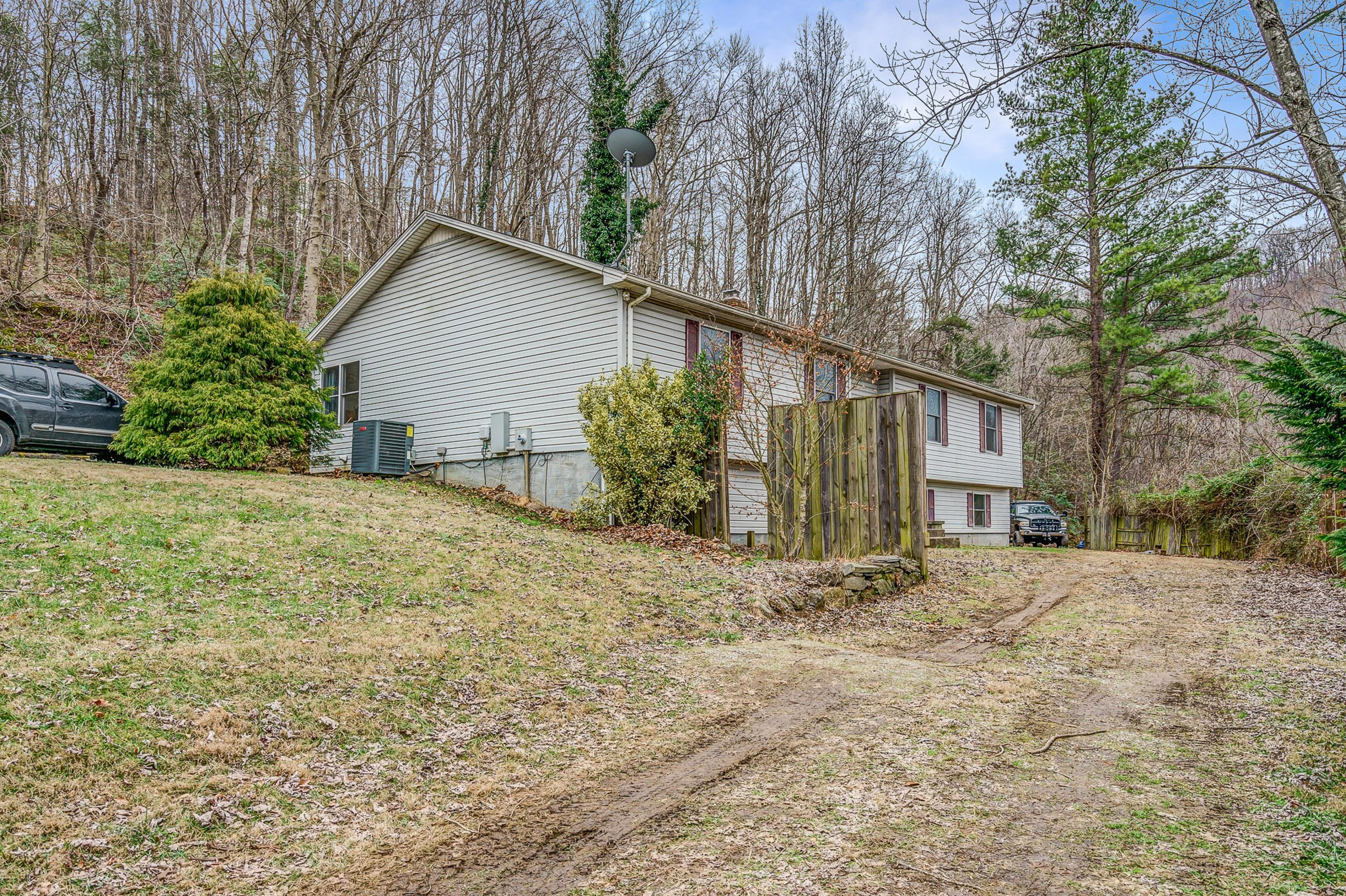 6071 Goodview Road Goodview, VA 24095 - Photo 3 of 44 front view of a house with a yard