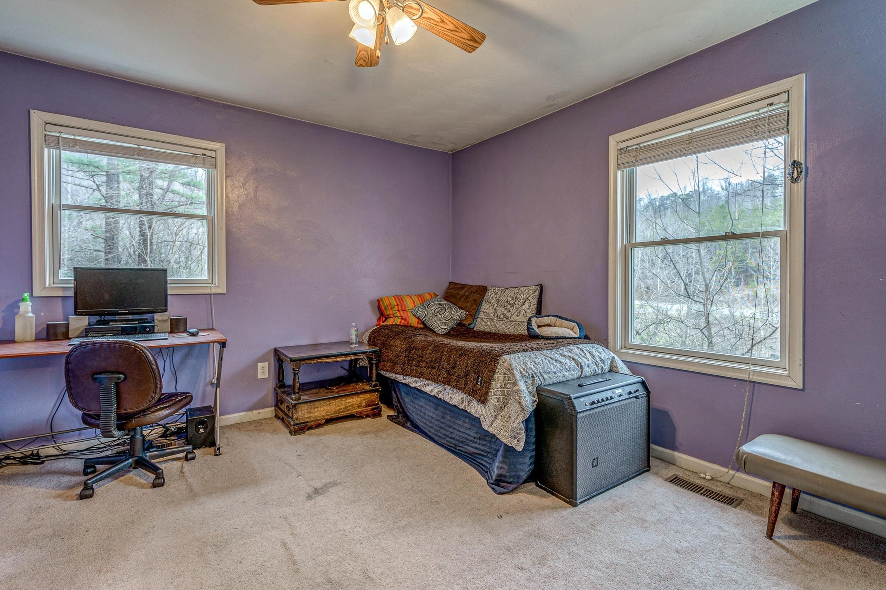 6071 Goodview Road Goodview, VA 24095 - Photo 24 of 44 a bedroom with a bed and a window