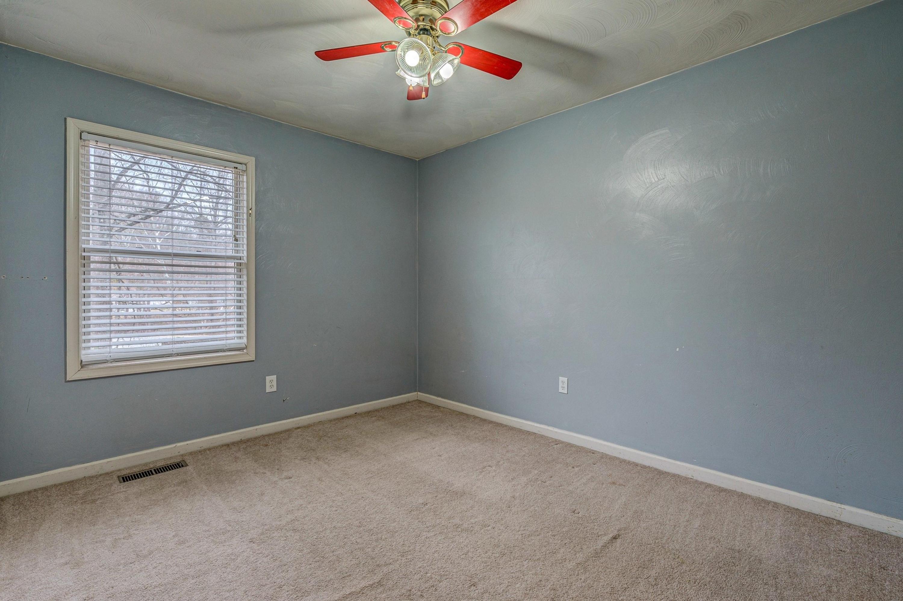 6071 Goodview Road Goodview, VA 24095 - Photo 26 of 44 an empty room with a window