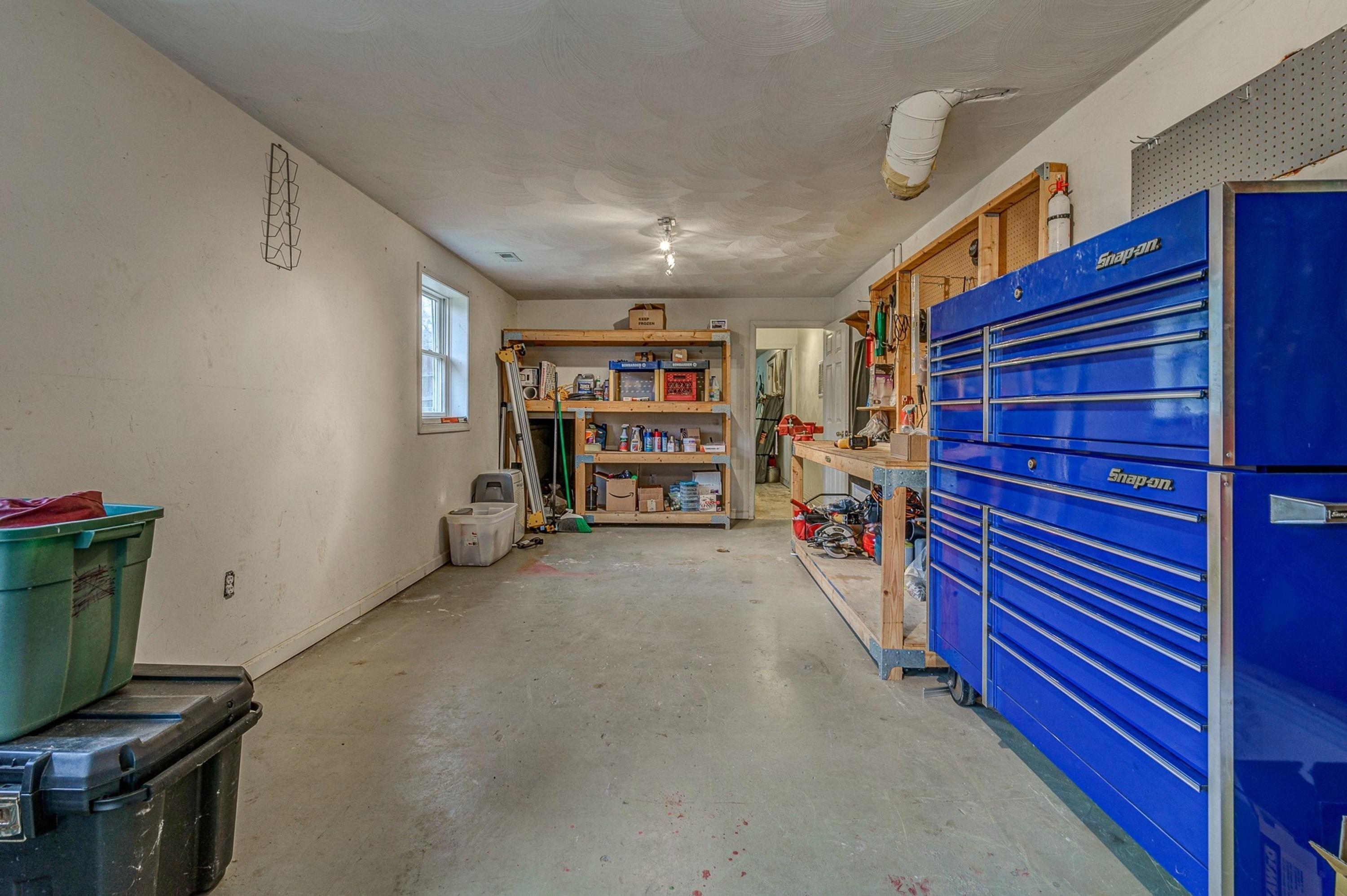 6071 Goodview Road Goodview, VA 24095 - Photo 29 of 44 a view of an empty room with storage