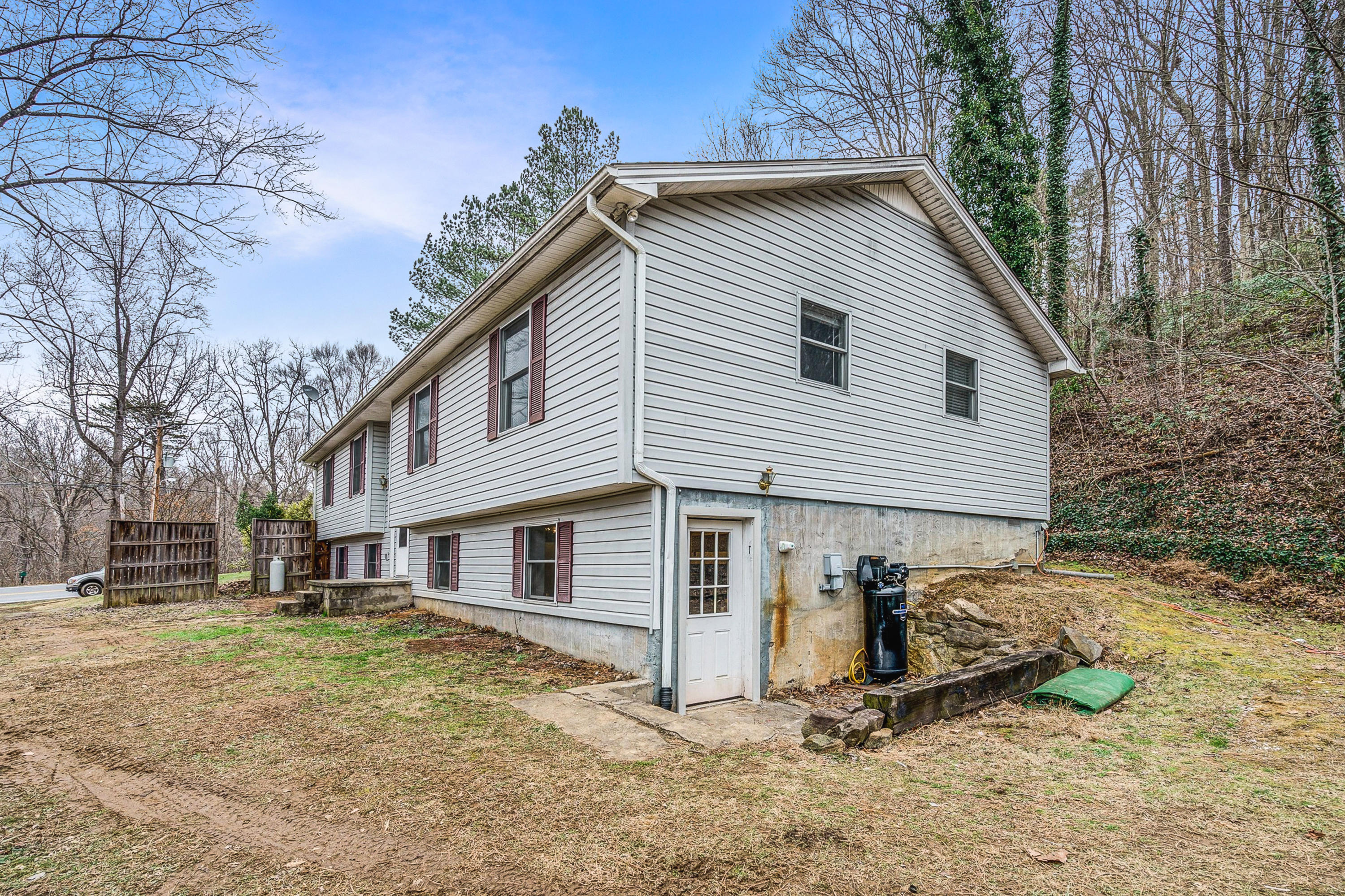 6071 Goodview Road Goodview, VA 24095 - Photo 4 of 44 a view of a house with a yard