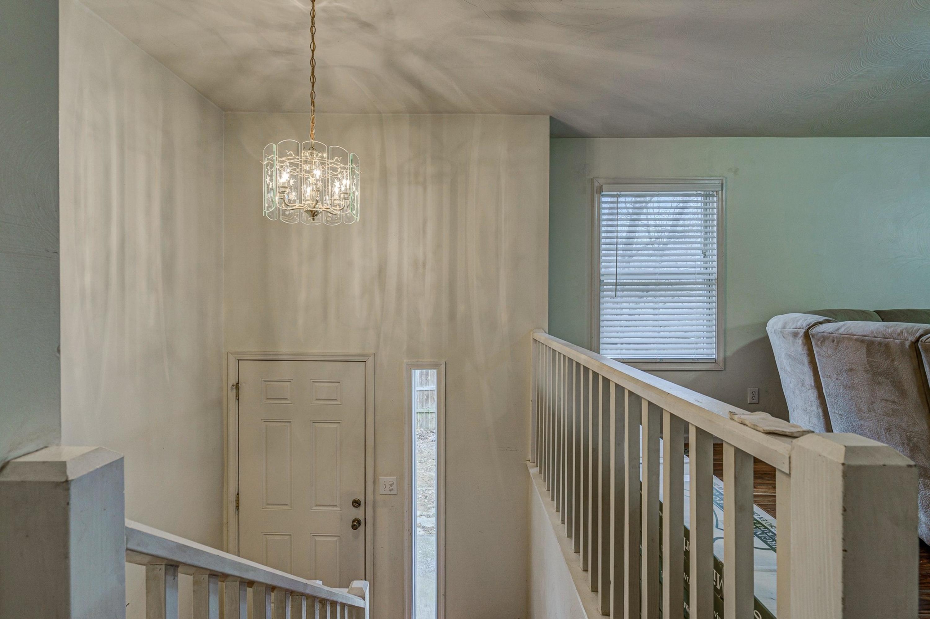 6071 Goodview Road Goodview, VA 24095 - Photo 9 of 44 a view of a hallway with windows