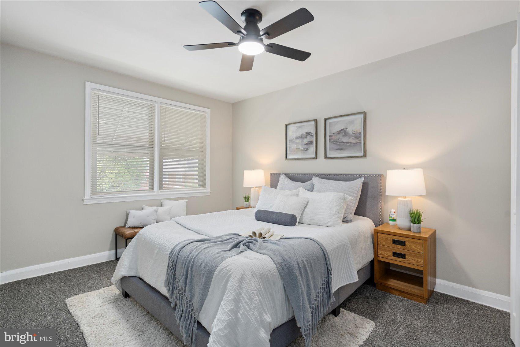 1020 Wicklow Road Baltimore, MD 21229 - Photo 25 of 44 a bedroom with a bed and a large window