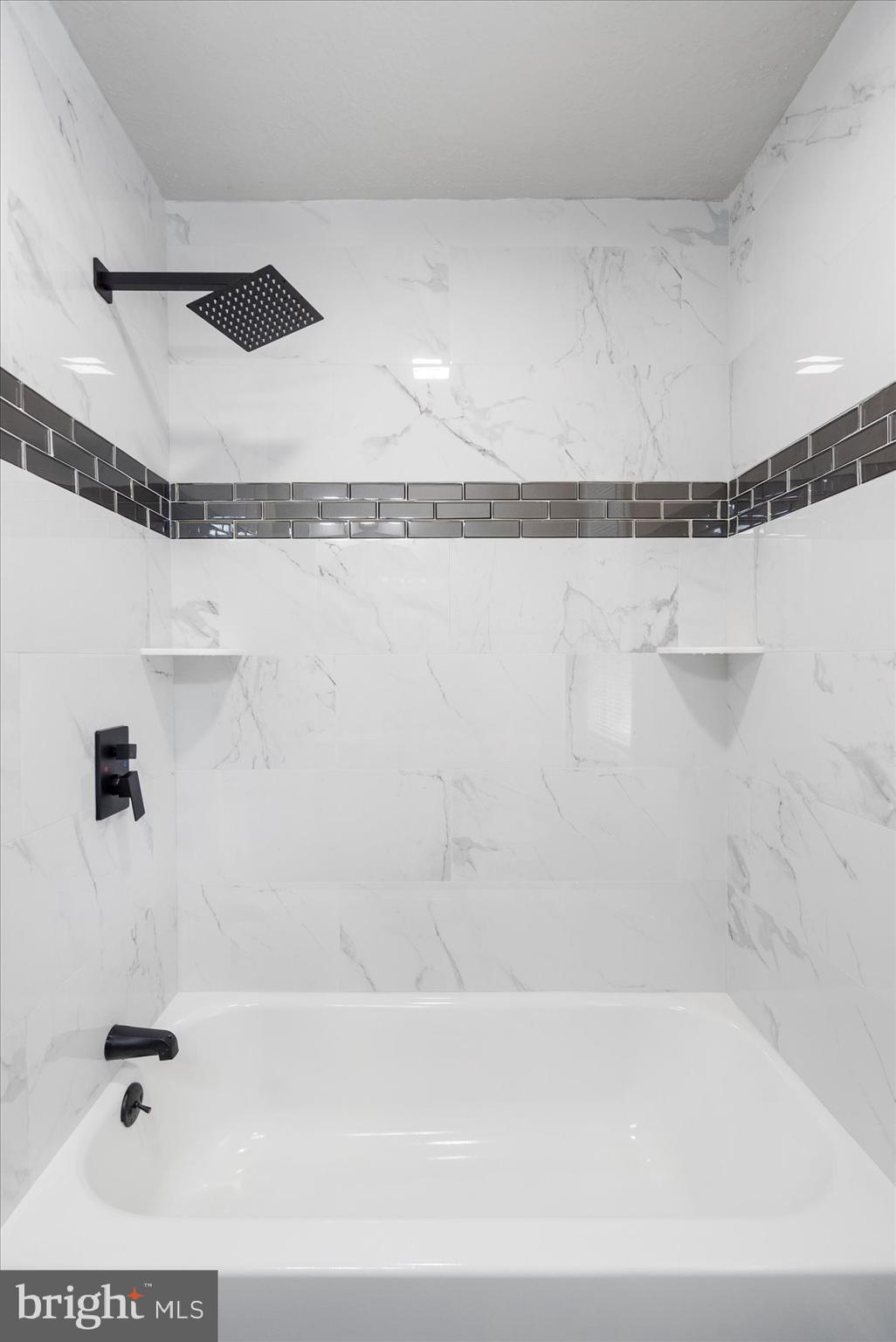 1020 Wicklow Road Baltimore, MD 21229 - Photo 30 of 44 a bathroom with a bathtub and a shower