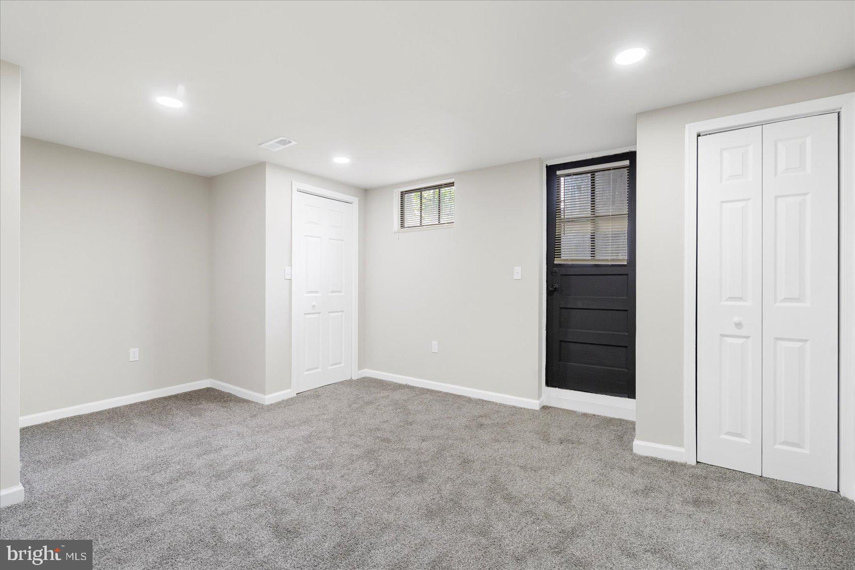 1020 Wicklow Road Baltimore, MD 21229 - Photo 33 of 44 an empty room with windows and closet