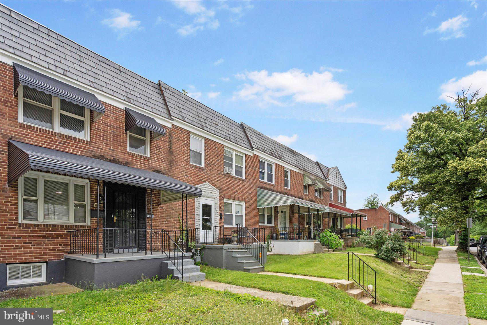 1020 Wicklow Road Baltimore, MD 21229 - Photo 39 of 44 a front view of a house with garden