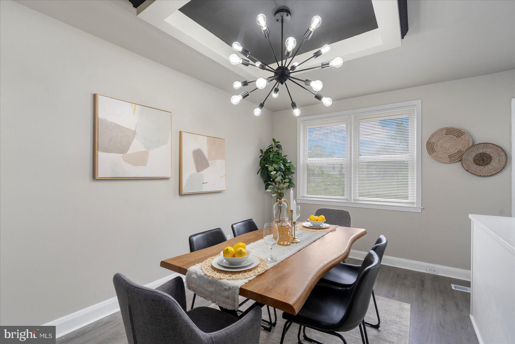 1020 Wicklow Road Baltimore, MD 21229 - Photo 8 of 44 a view of a dining room with furniture and chandelier