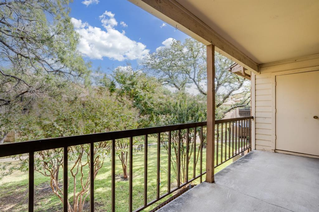 16301 Ledgemont Lane, Unit 267 Addison, TX 75001 - Photo 22 of 25 a view of a porch