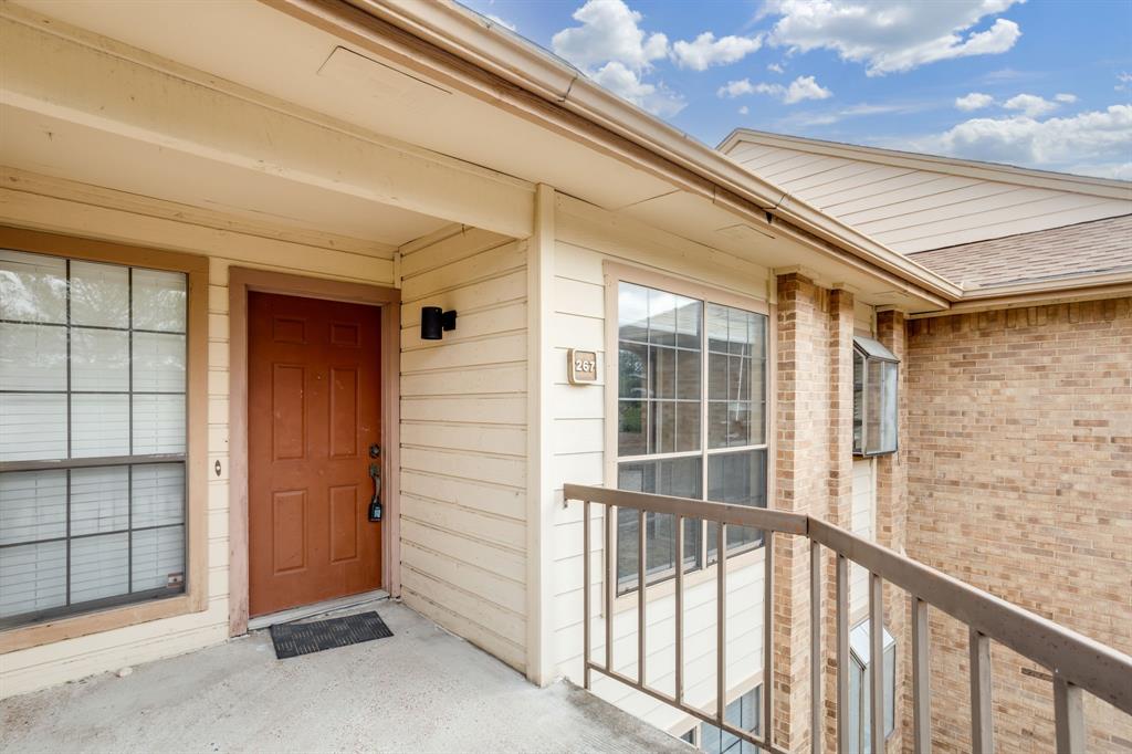 16301 Ledgemont Lane, Unit 267 Addison, TX 75001 - Photo 3 of 25 a view of a porch