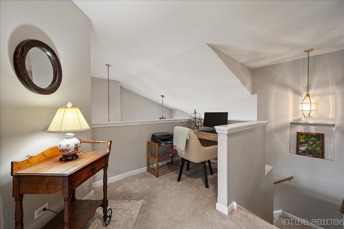 332 Wolcott Lane Batavia, IL 60510 - Photo 18 of 28 a view of a workspace with furniture and a bathroom