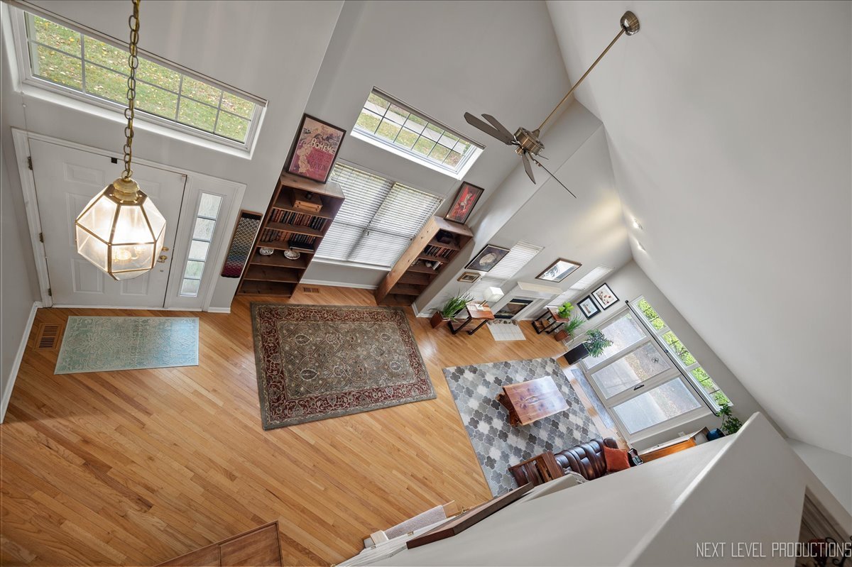 332 Wolcott Lane Batavia, IL 60510 - Photo 19 of 28 a view of entryway and hall with wooden floor