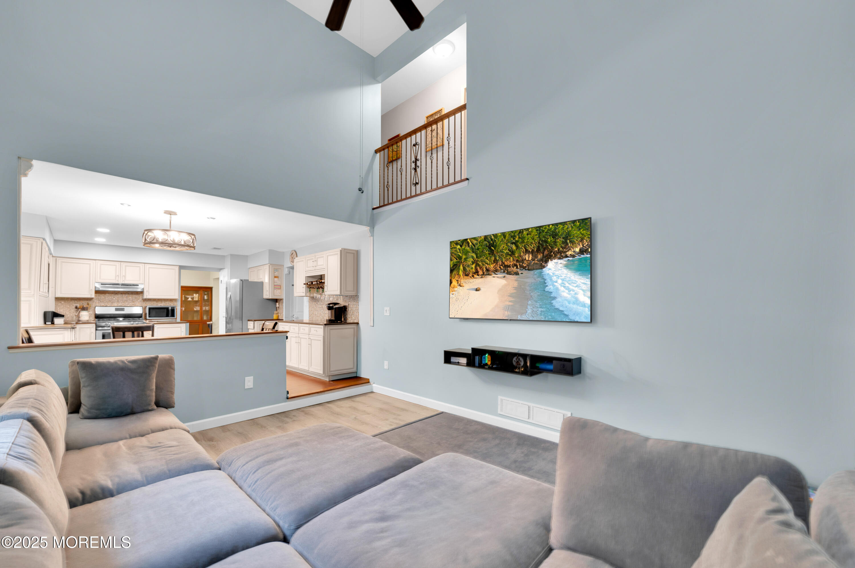 76 Diamond Lane Howell, NJ 07731 - Photo 11 of 36 a living room with furniture and a flat screen tv