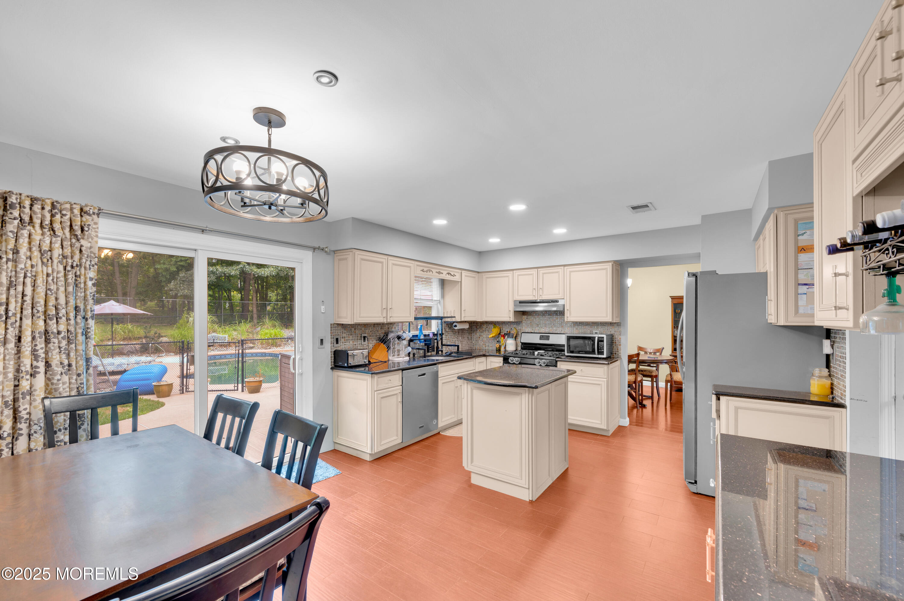 76 Diamond Lane Howell, NJ 07731 - Photo 13 of 36 a view of a dining room with furniture window and outside view