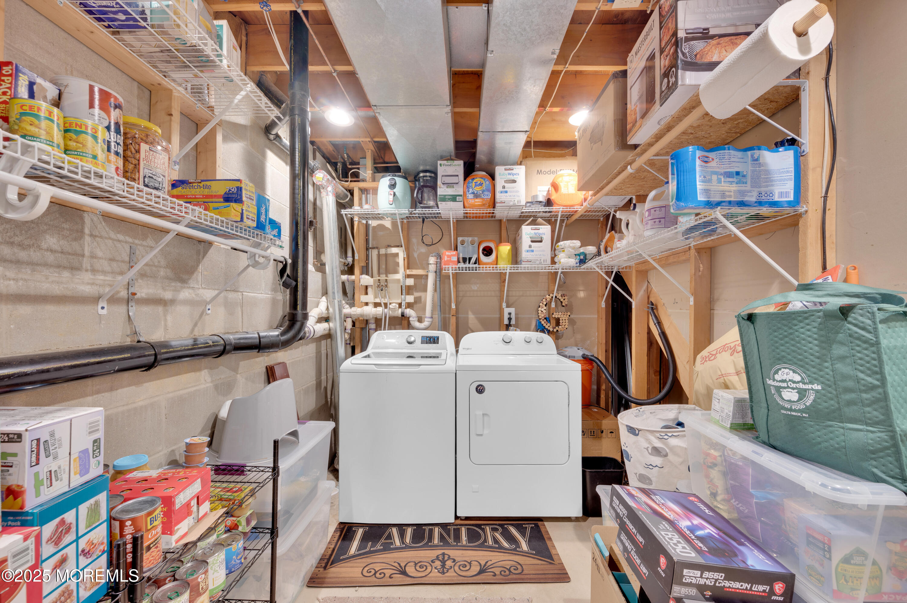 76 Diamond Lane Howell, NJ 07731 - Photo 16 of 36 a utility room with dryer and washer