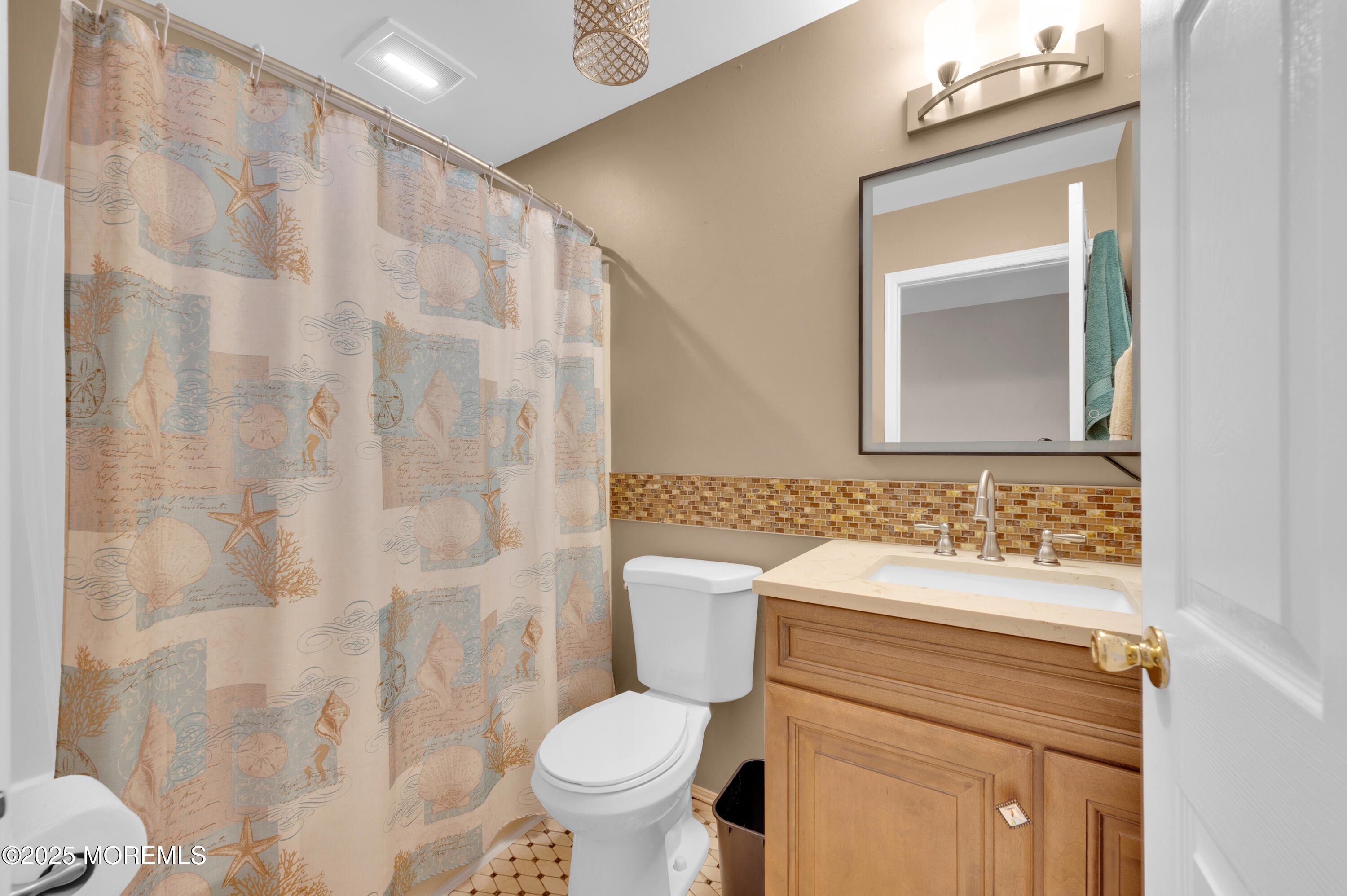 76 Diamond Lane Howell, NJ 07731 - Photo 22 of 36 a bathroom with a sink toilet and shower