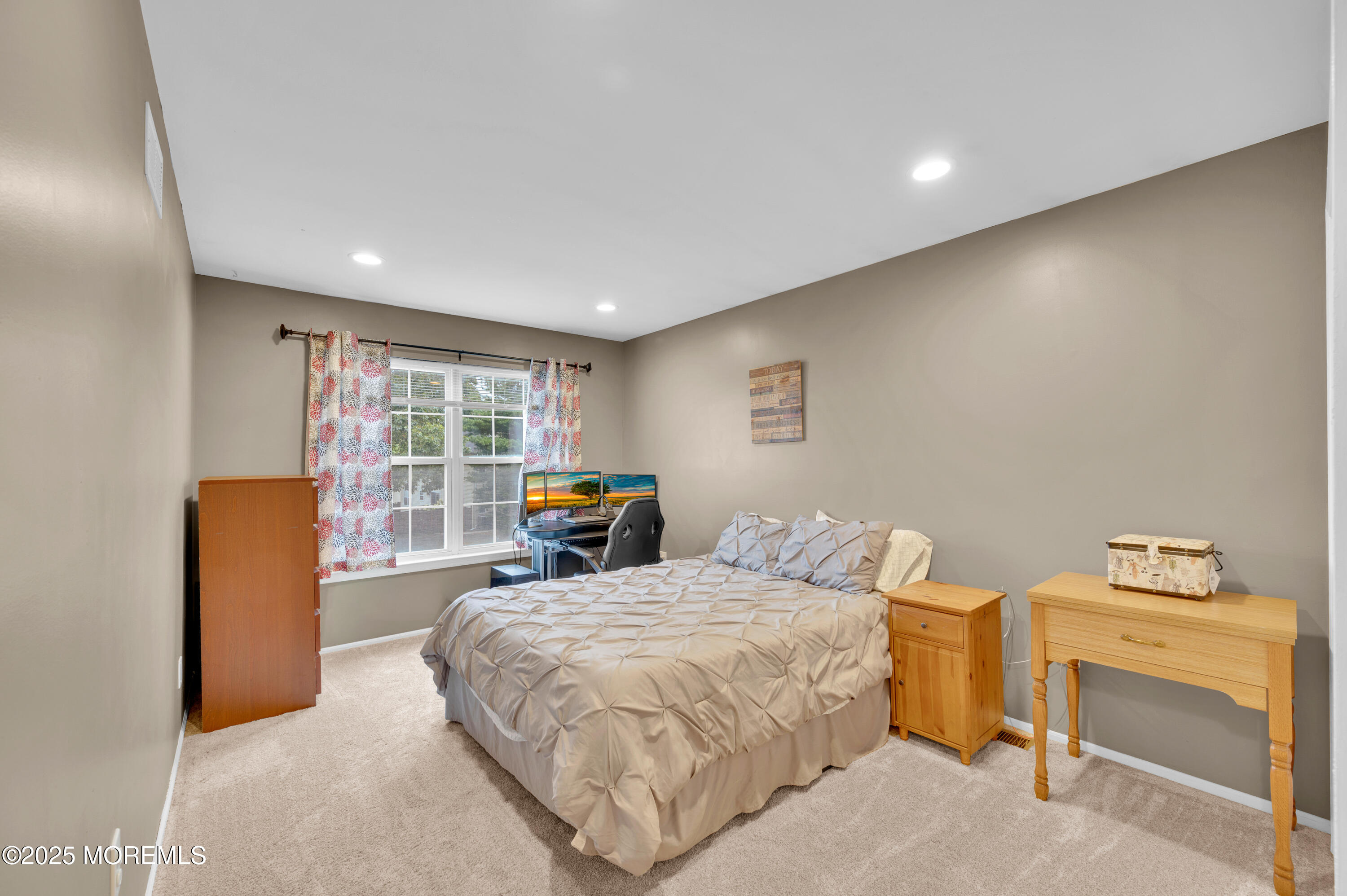 76 Diamond Lane Howell, NJ 07731 - Photo 24 of 36 a bedroom with a bed and wooden floor