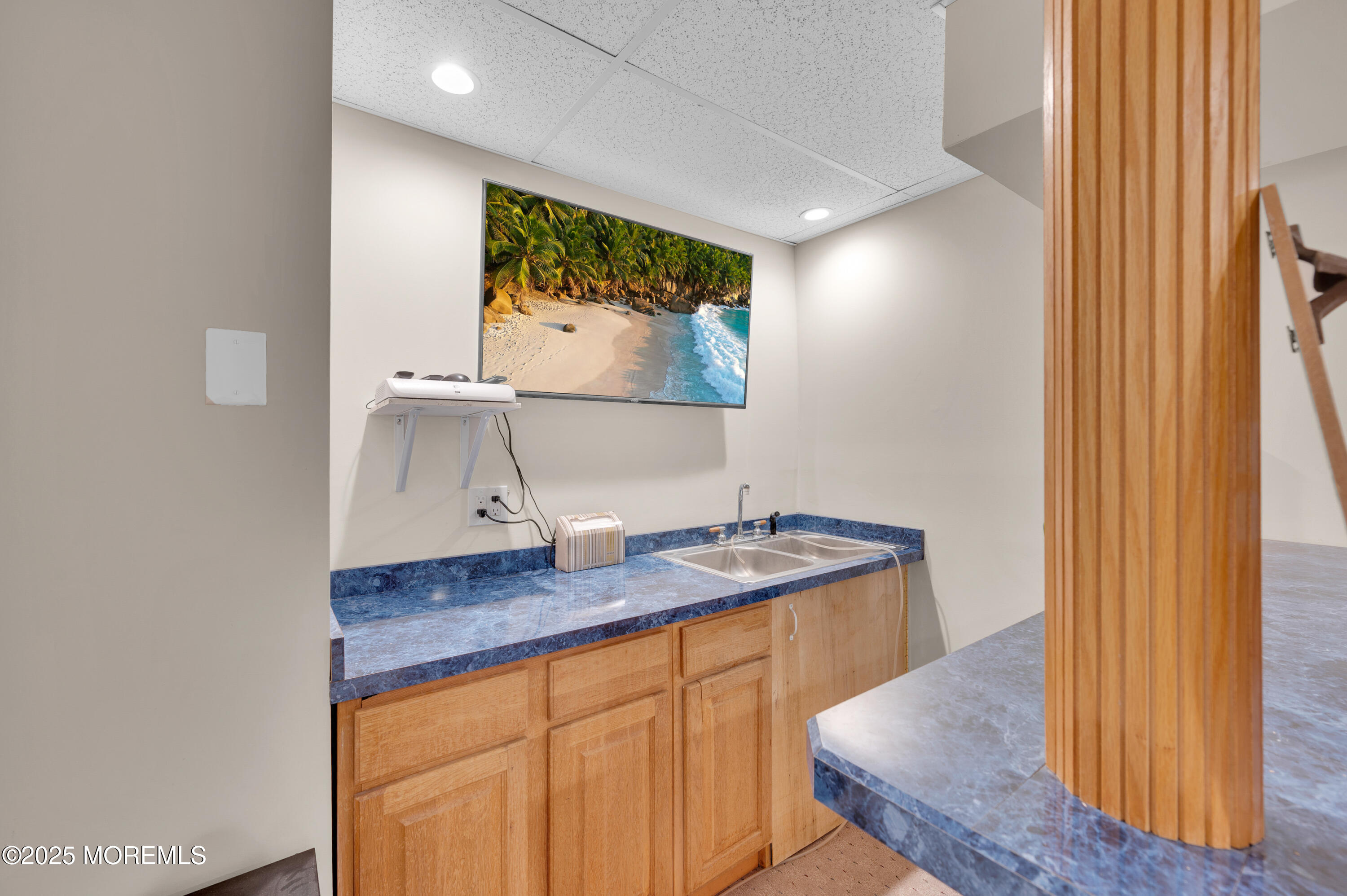 76 Diamond Lane Howell, NJ 07731 - Photo 26 of 36 a bathroom with a granite countertop sink and a mirror