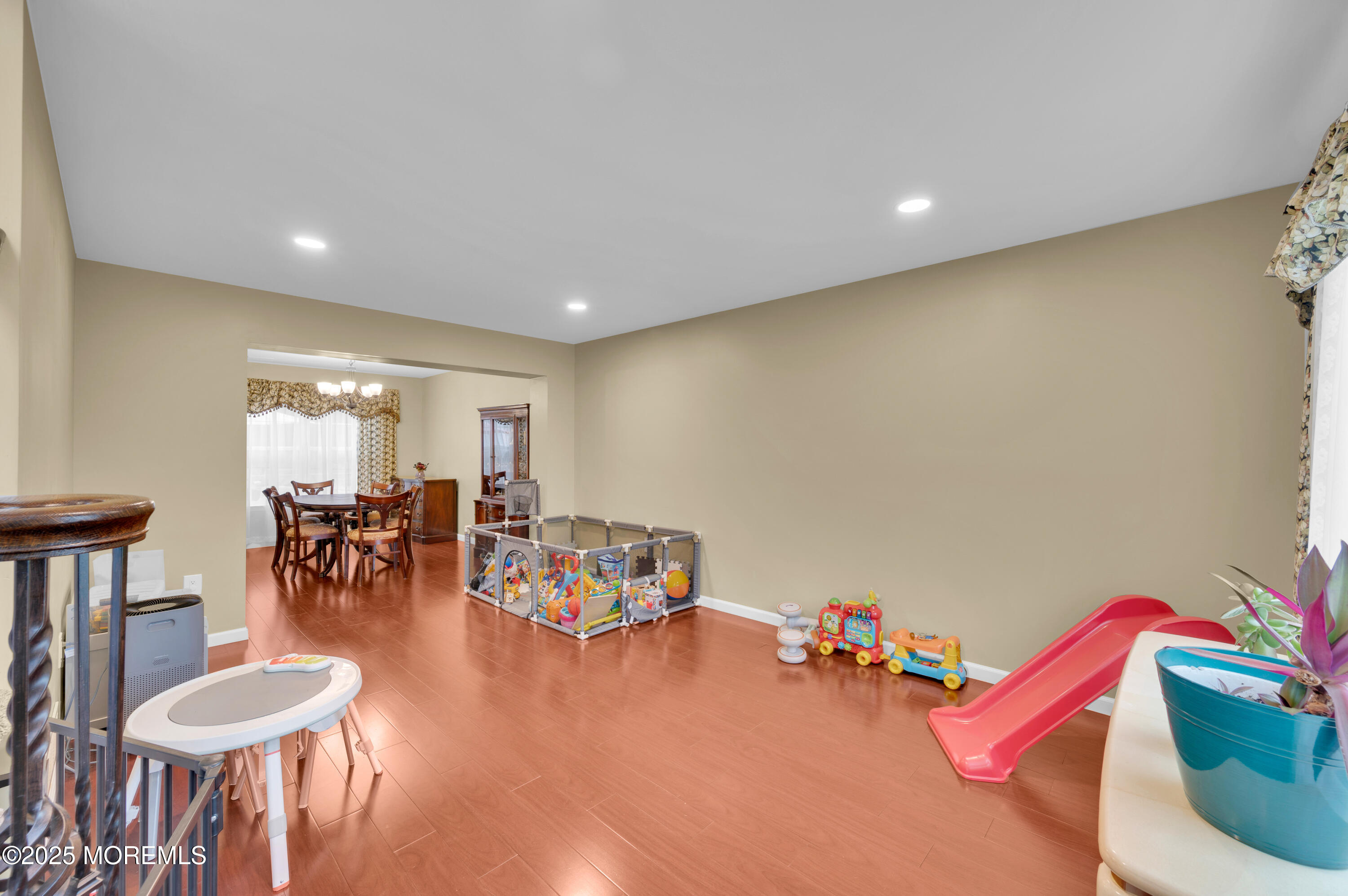76 Diamond Lane Howell, NJ 07731 - Photo 3 of 36 a living room with furniture and a wooden floor