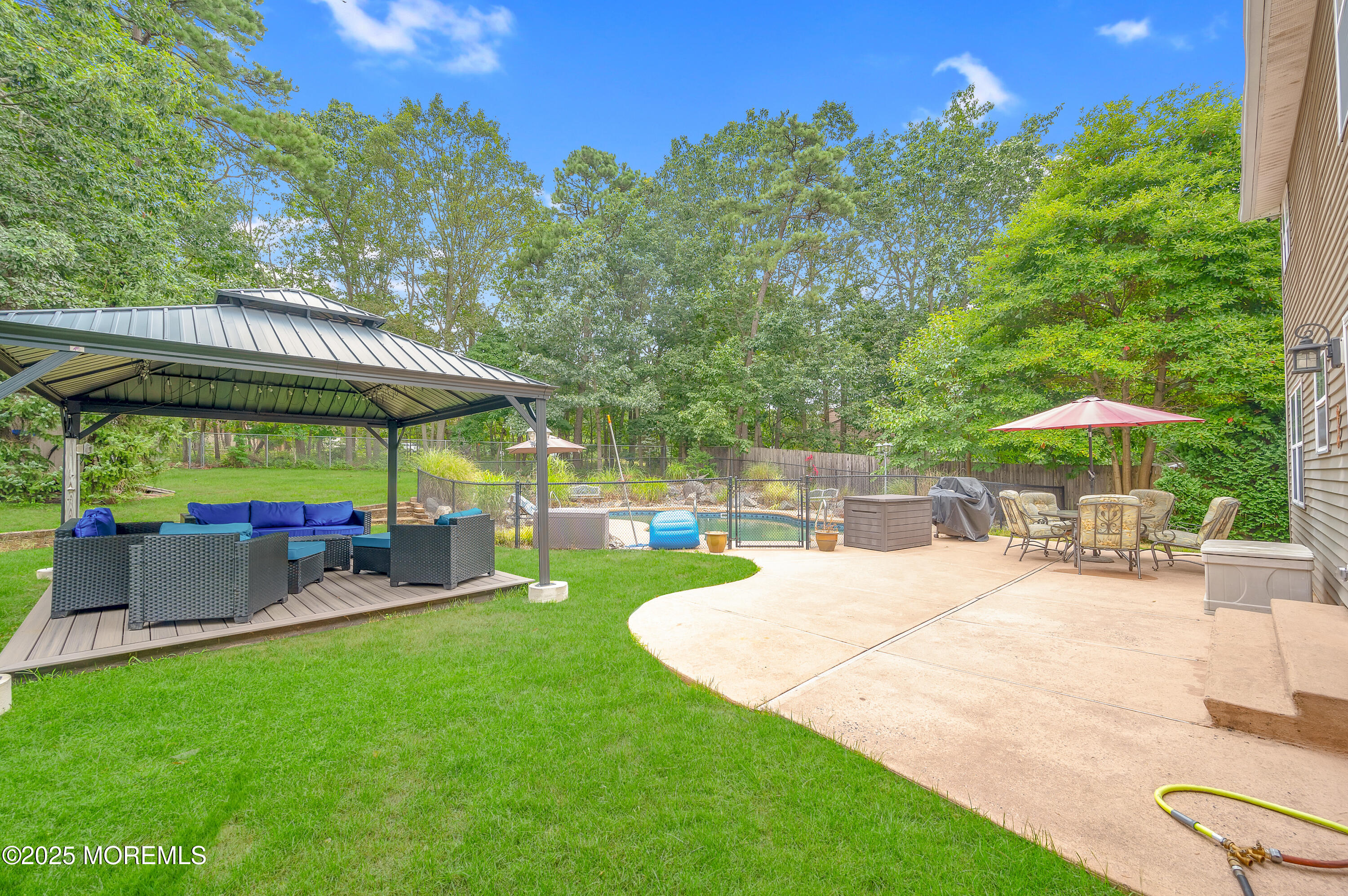 76 Diamond Lane Howell, NJ 07731 - Photo 31 of 36 a view of a swimming pool with a patio