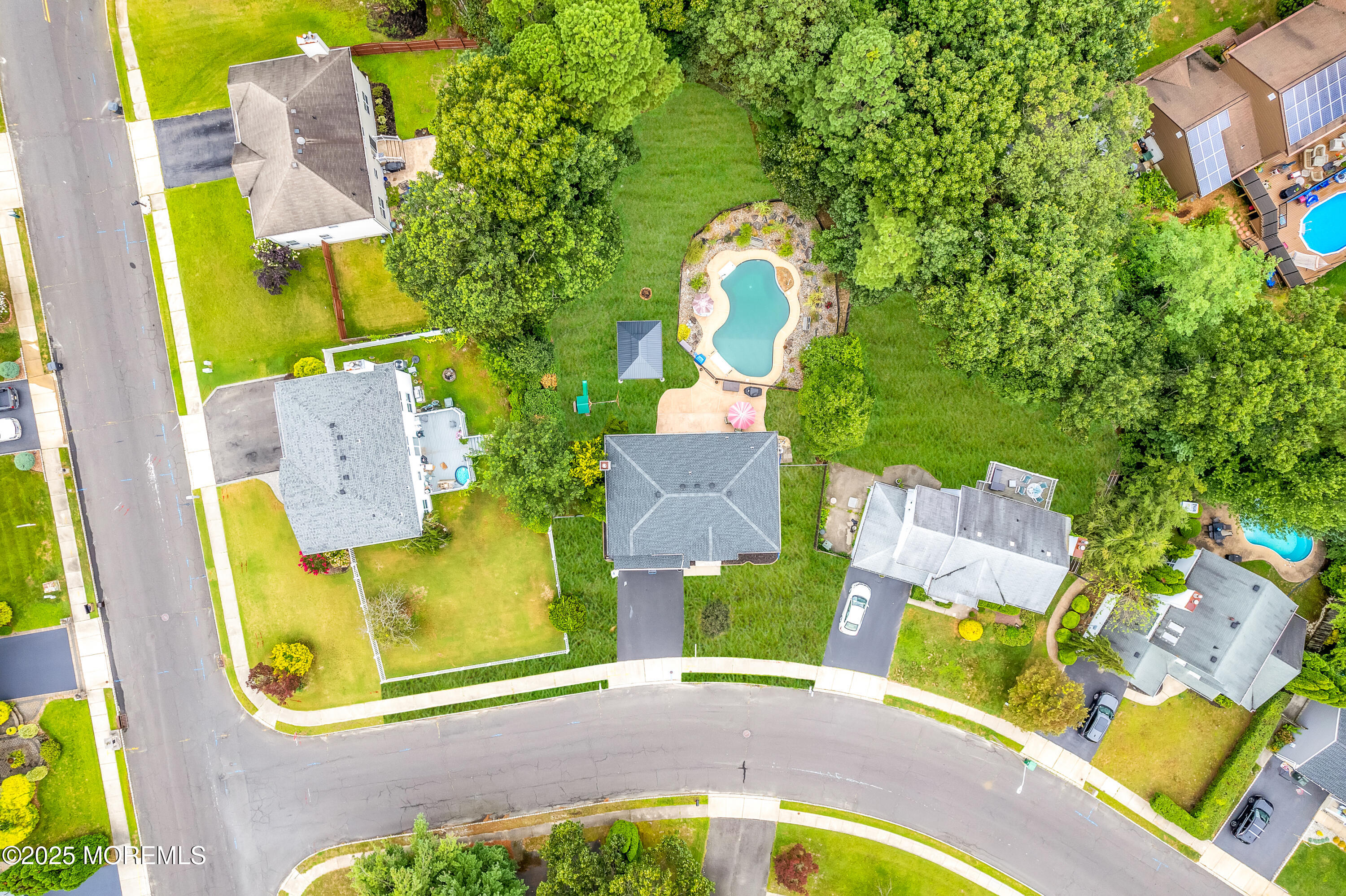 76 Diamond Lane Howell, NJ 07731 - Photo 32 of 36 aerial view of a swimming pool