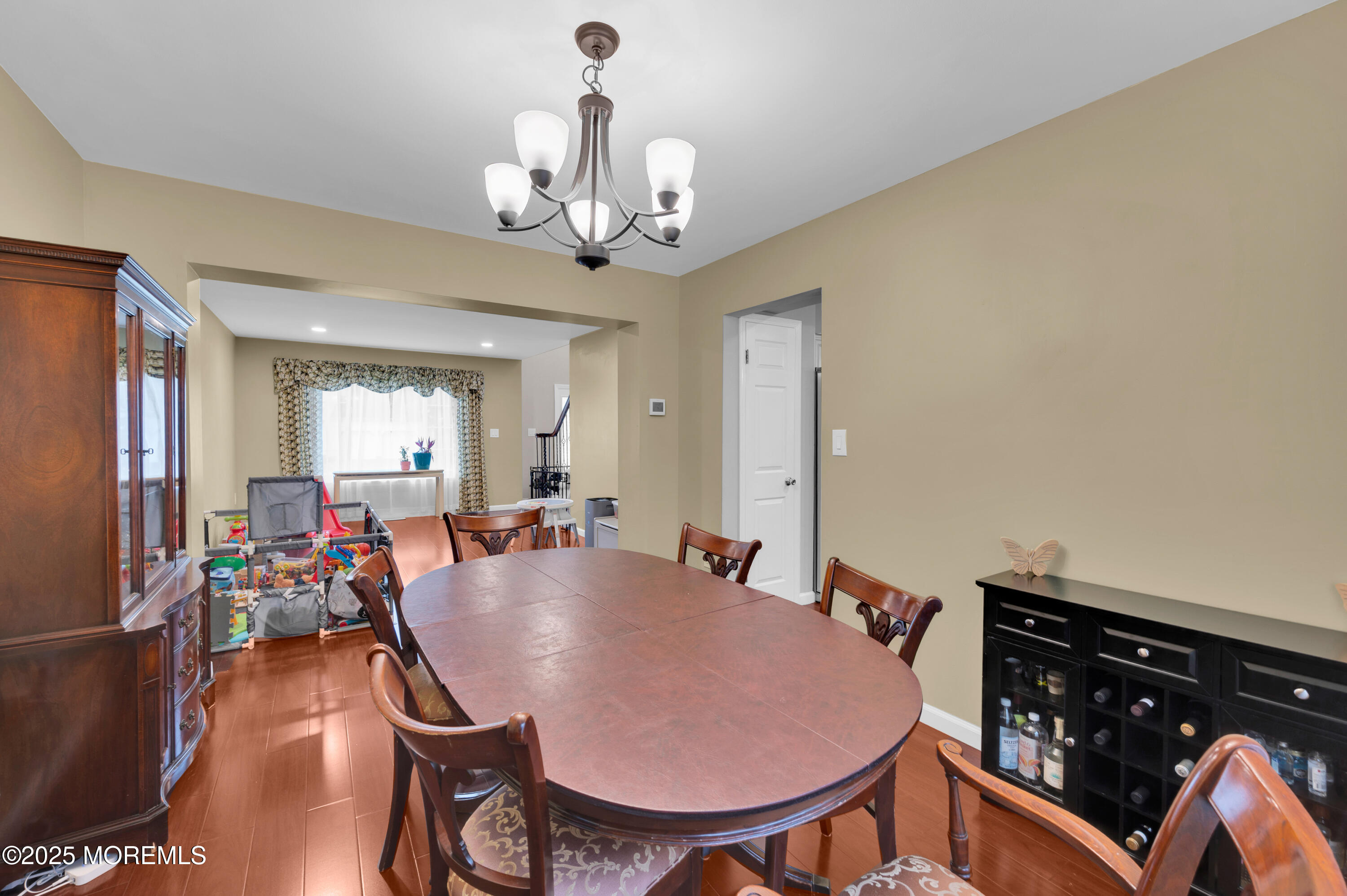 76 Diamond Lane Howell, NJ 07731 - Photo 8 of 36 a view of a dining room with furniture and chandelier